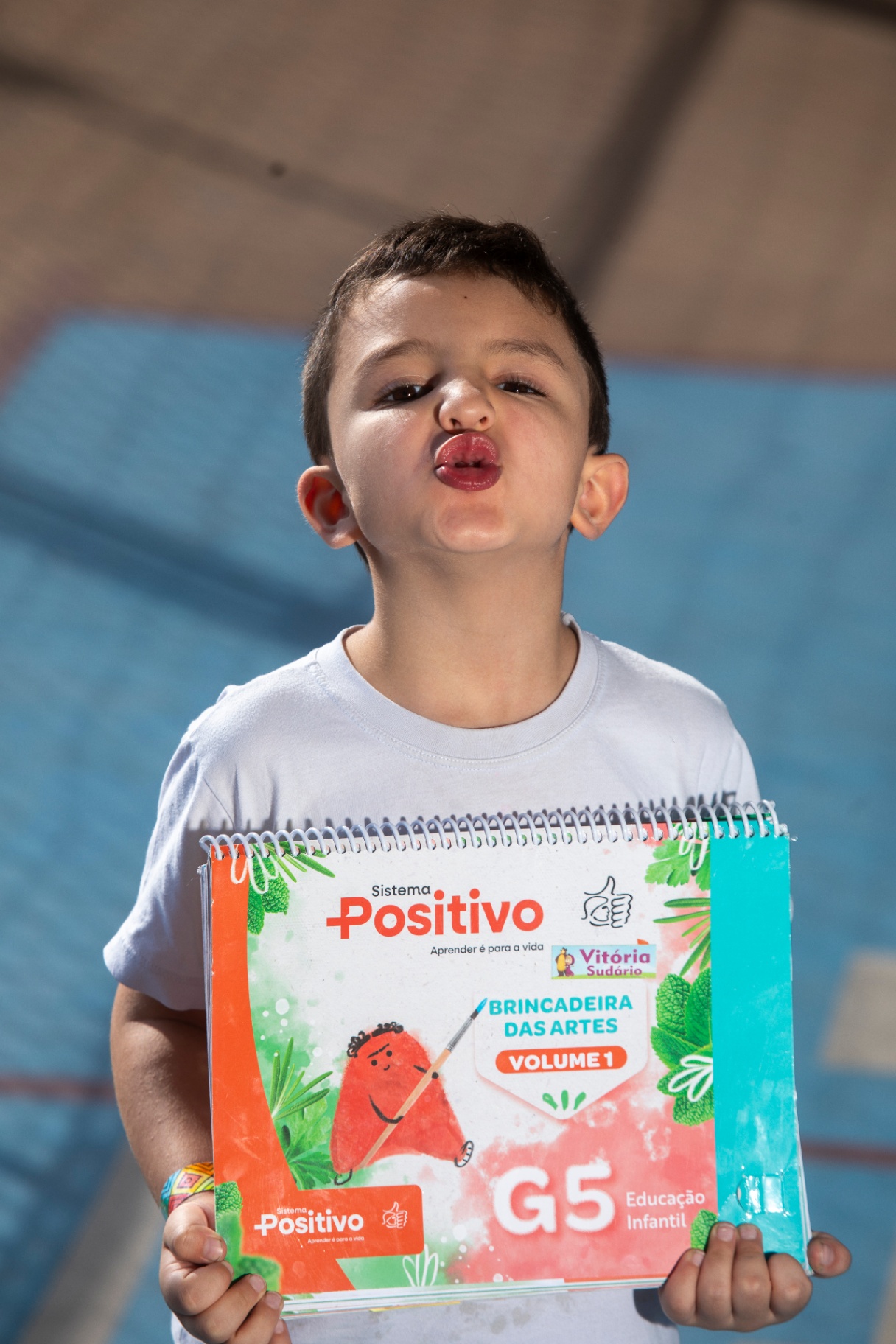 Aluno da Educação Infantil sorrindo